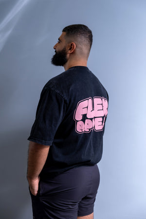 Man wearing back view of Flex Appeal graphic t-shirt