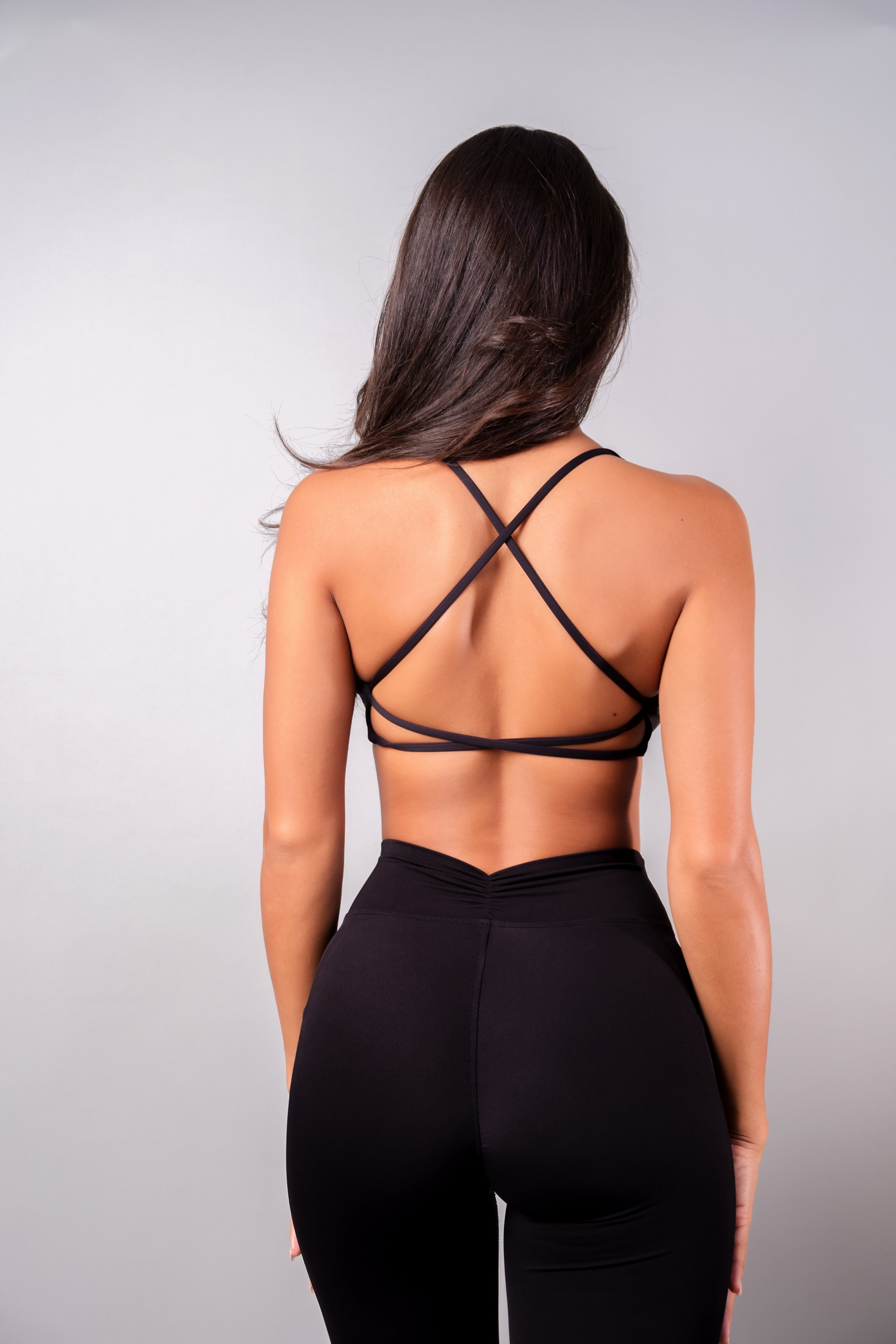 Back view of Serenity Twist Bra with cross-string design – Verve gym wear
