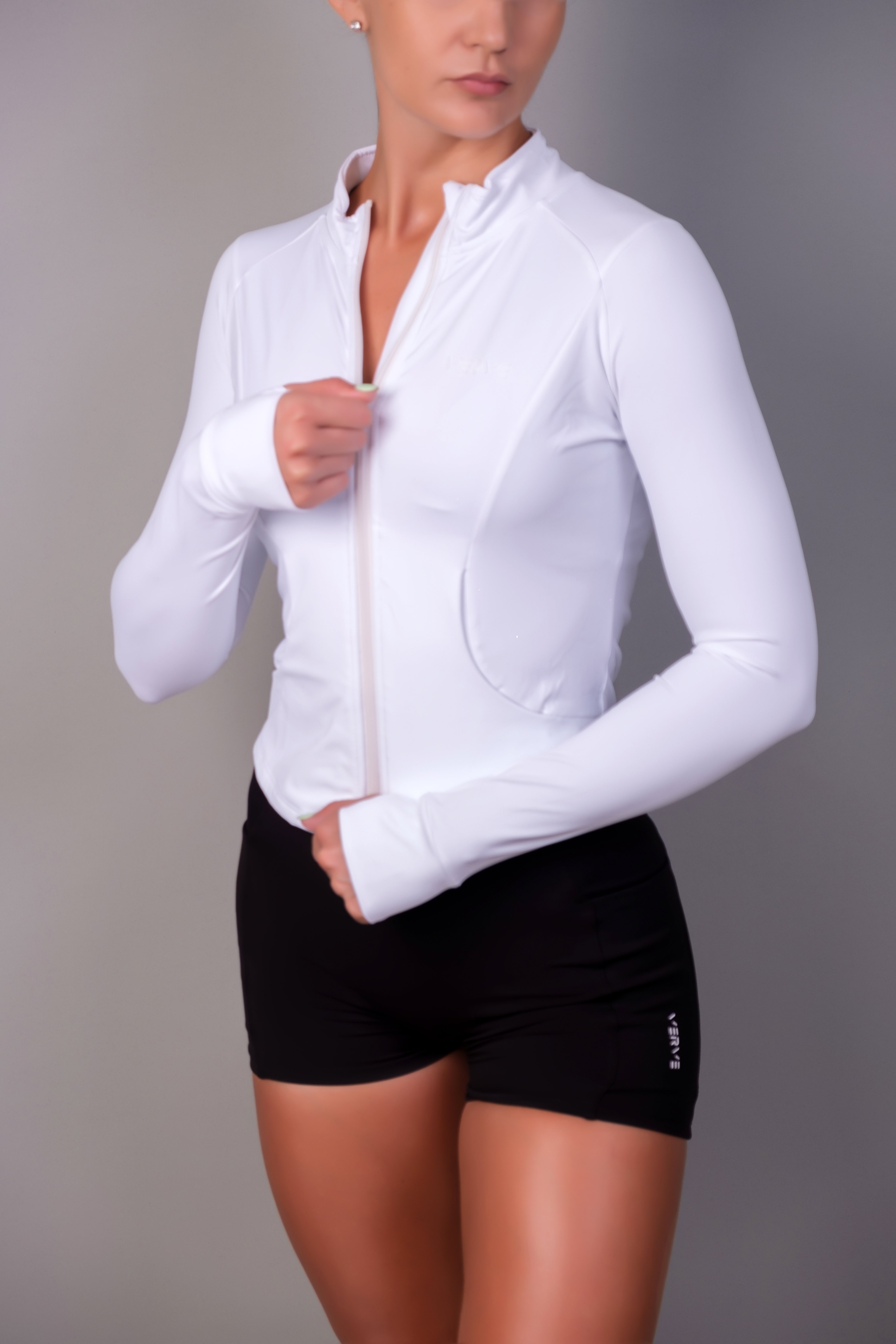 White Form Zip-Up Jacket with zip closure, breathable fabric and sleek design – Verve gym wear
